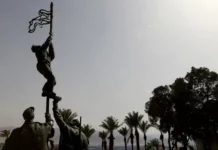 Opinion: Israel Was Not Given on a Silver Platter A statue of a flag-raising.