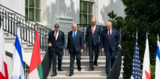 President Donald Trump, Minister of Foreign Affairs of Bahrain Dr. Abdullatif bin Rashid Al-Zayani, Israeli Prime Minister Benjamin Netanyahu and Minister of Foreign Affairs for the United Arab Emirates Abdullah bin Zayed Al Nahyan walk to sign the Abraham Accords, Sept. 15, 2020, at the White House.