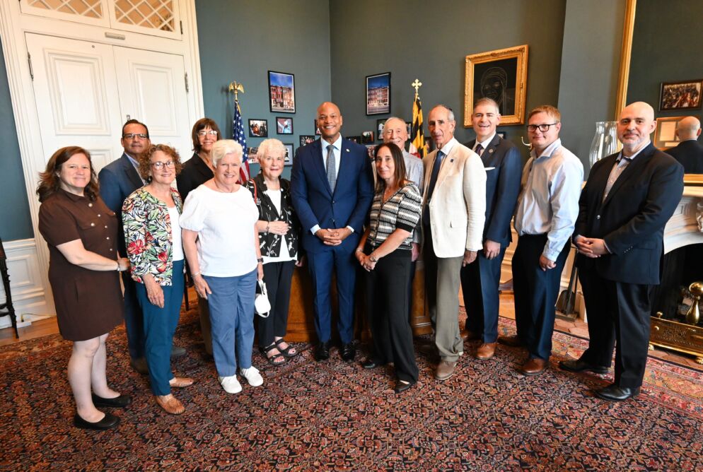 Gov. Wes Moore with volunteers who brought thank you petitions.