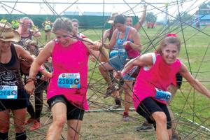 Jody Sklar and the rest of her team compete in the LoziLu Women’s Mud Run in Washington in July. The 5k event sends women racing across a muddy obstacle course to raise money for leukemia and lymphoma research. The event encourages getting dirty for a good cause.