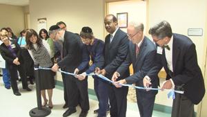 At the ribbon-cutting ceremony of the new Kosher Pantry, are, from left, John Sackett, president of Shady Grove Adventist; William G. "Bill" Robertson president and CEO of Adventist  Healthcare; Montgomery County Executive Ike Leggett; Jeremy Jacobson of Shady Grove Adventist Hospital;  Rabbi Sholom Raichik of Chabad of Upper Montgomery County; Ismael Gama, associate vice president of Shady Grove Adventist; Audrey Siegel, executive director of Bikur Cholim of Greater Washington.  Photo by Jeffrey Reches