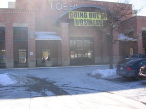 A going out of business banner adorns the outside of Loehmann's, home to designer clothes at up to 70 percent off. 