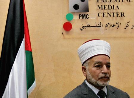 The Mufti of Jerusalem Mohammed Hussein, pauses during a media conference in the West Bank town of Ramallah, 2006. (AP Photo/Muhammed Muheisen)
