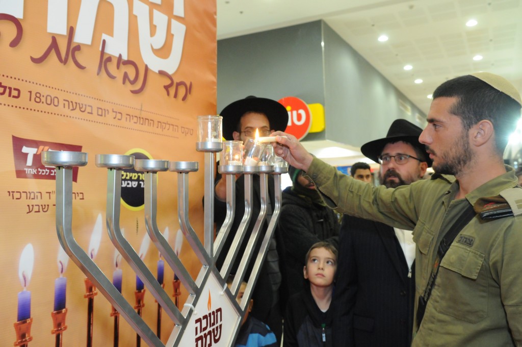 Chabad Lubavitch of Upper Montgomery County sponsored a menorah that was placed in the Beersheva Central Bus Terminal where IDF soldier Omri Levi was murdered in a terrorist attack. The menorah sponsorship came after a solidarity trip Rabbi Sholom Raichik of Chabad Lubavitch of Upper Montgomery County took to Israel in October just after the attack.Community_Israel_Menorah