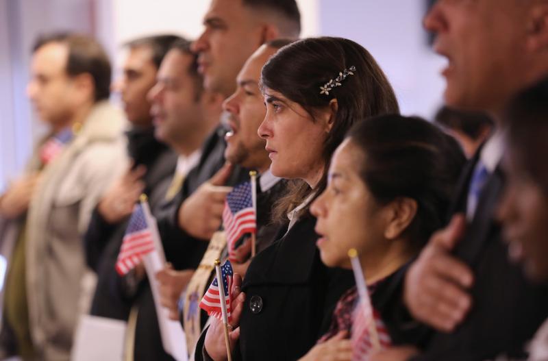 Immigrants take their oath of U.S. citizenship at the Federal Building in Newark, N.J., in a 2014 ceremony. Photo by John Moore/Getty Images via JTA