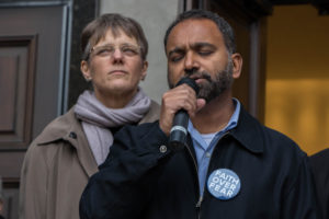 Ehsan Baig, right, of the All Dulles Area Muslim Society, chants the call to prayer in front of Washington Hebrew Congregation as Bishop Mariann Edgar Budde listens.