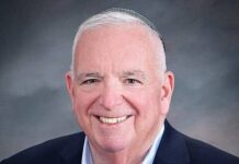 Opinion: Trauma in the Halls: Why Fairfax Schools Must Take a Stand A man wearing a suit jacket.