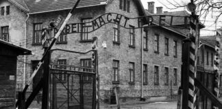 A building with a gate in front of it.