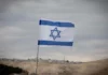 A blue and white Israeli flag.