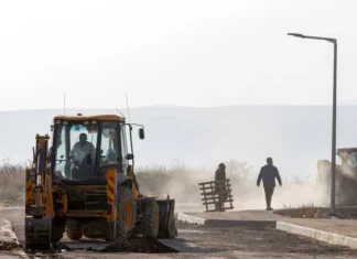 A bulldozer at a construction site.