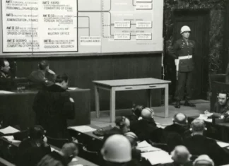 A black and white photo of a courtroom scene.