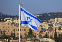 Opinion: Israel’s Moral Test — and Ours Flag of Israel in Jerusalem.