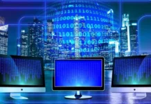 An impressionistic image of computer screens.
