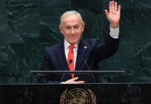 Netanyahu Calls Mamdani an Antisemite who Endangers Jews in New York Israel's Prime Minister Benjamin Netanyahu waves at the United Nations General Assembly in New York on Sept. 24, 2026.